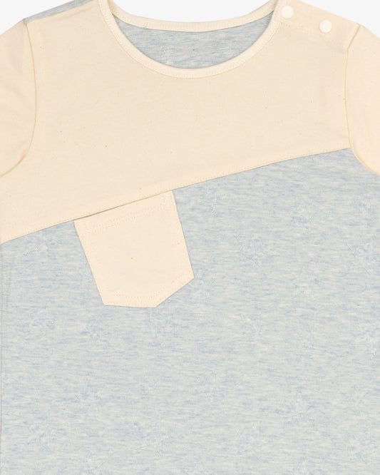 Angled baby bodysuit